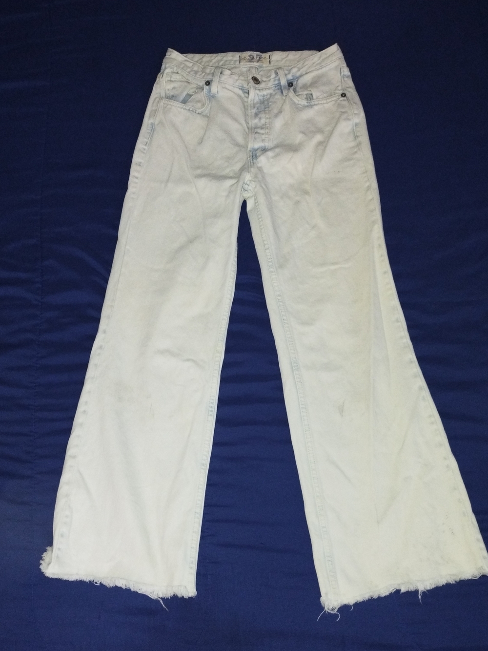 We The Free Cream Flare Jeans with Frayed Hem